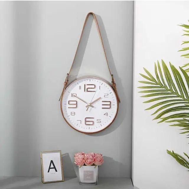 Horloge murale au design moderne avec bracelet en cuir – Une touche décorative élégante pour la maison