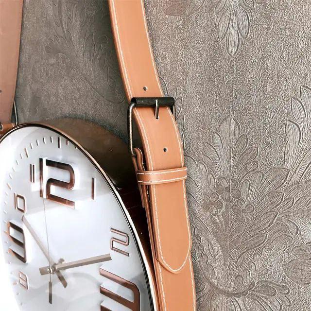 Horloge murale au design moderne avec bracelet en cuir – Une touche décorative élégante pour la maison